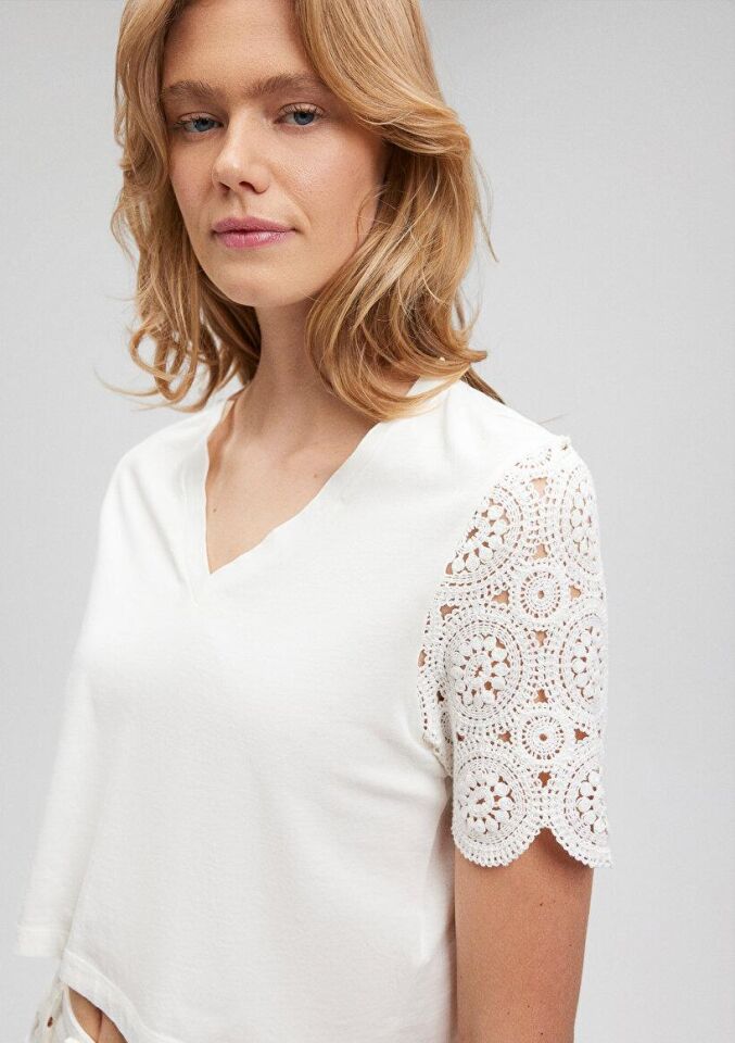 MAVİ KADIN KOLLARI GÜPÜRLÜ ÖRME BLUZ Kırık Beyaz 1611467-70057