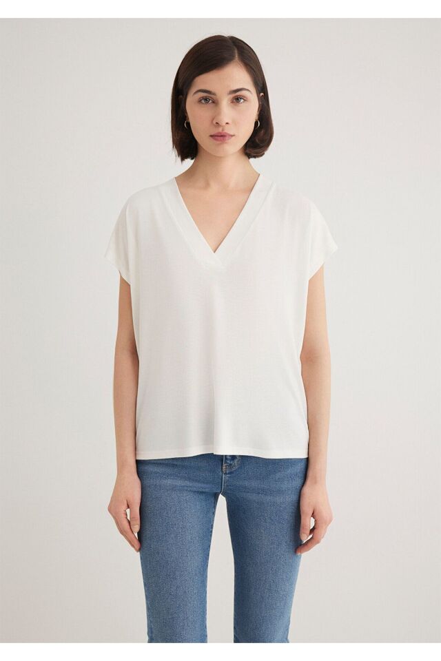 MAVİ KADIN KOLSUZ PENYE UST Kırık Beyaz 1612250-70057