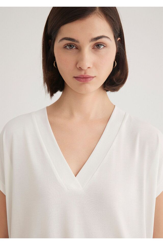 MAVİ KADIN KOLSUZ PENYE UST Kırık Beyaz 1612250-70057